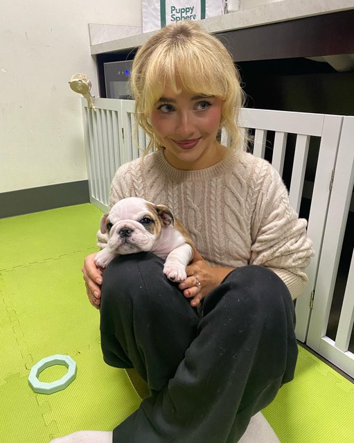 American singer and actress Sabrina Carpenter takes a break from her tour to snuggle with a sweet pup early October 2024. (Photo by sabrinacarpenter/Instagram)