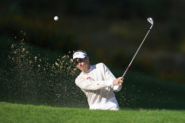 Ryann O'Toole of the United States hits out of a bunker on the 14th green during the final round of the LPGA Ladies Championship golf tournament at the Seowon Valley Country Club in Paju, South Korea, Sunday, October 20, 2024. (Photo by Lee Jin-man/AP Photo)