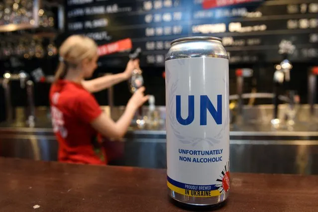 This photo shows a can of a locally brewed beer created by the Pravda beer bar and called, “UN, Unfortunately, Non-Alcoholic”, in the western Ukrainian city of Lviv on July 1, 2022. (Photo by Yuriy Dyachyshyn/AFP Photo)