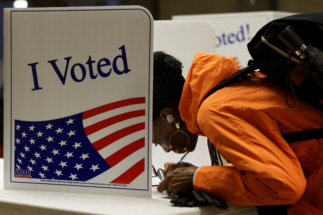 A person votes in the 2024 U.S. presidential election on Election Day, at Pittsburgh Manchester School in Pittsburgh, Pennsylvania, U.S., November 5, 2024. (Photo by Quinn Glabicki/Reuters)