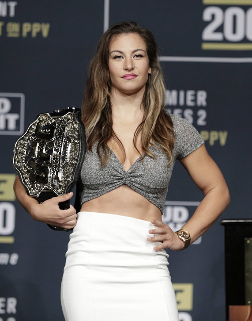 Miesha Tate poses for photographers during a UFC 200 mixed martial arts news conference, Wednesday, July 6, 2016, in Las Vegas. Tate is scheduled to fight Amanda Nunes in a women's bantamweight championship fight at UFC 200 on Saturday. (Photo by John Locher/AP Photo)