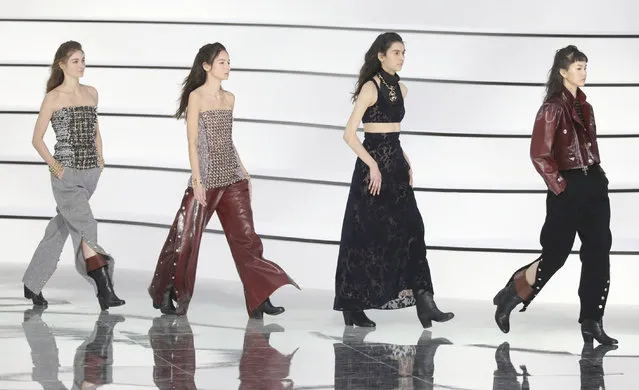 Models wear creations for the Chanel fashion collection during Women's fashion week Fall/Winter 2020/21 presented in Paris, Tuesday, March 3, 2020. (Photo by Vianney Le Caer/Invision/AP Photo)