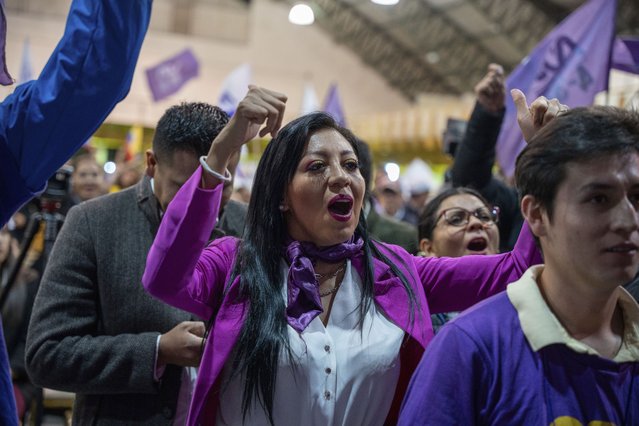 Supporters of candidate Daniel Noboa celebrate his victory in the runoff presidential election, in Quito, Ecuador, Sunday, October 15, 2023. (Photo by Carlos Noriega/AP Photo)