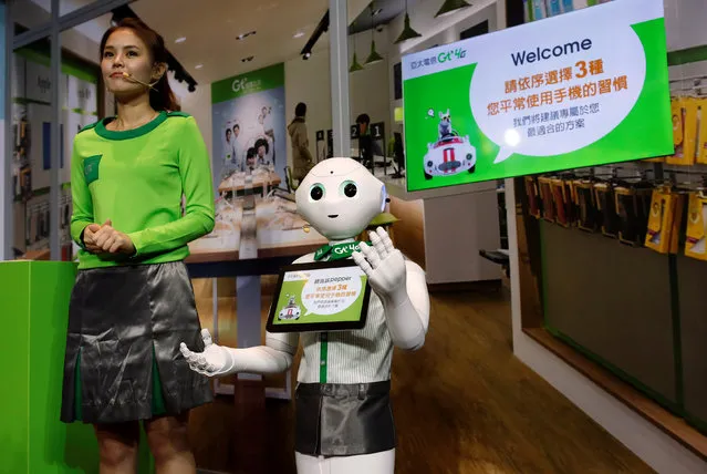 SoftBank's robot “Pepper” dressed in Asia Pacific Telecom uniform, is displayed during a news conference in Taipei, Taiwan July 25, 2016. (Photo by Tyrone Siu/Reuters)