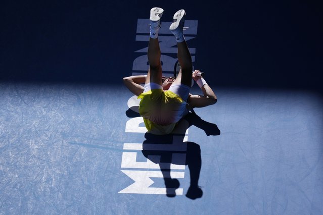 Ben Shelton of the U.S. falls during his quarterfinal match against Lorenzo Sonego of Italy at the Australian Open tennis championship in Melbourne, Australia, Wednesday, January 22, 2025. (Photo by Vincent Thian/AP Photo)