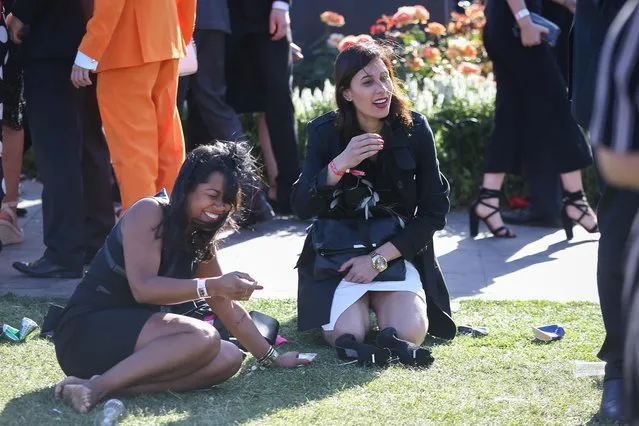 Racegoers enjoy the atmosphere following 2017 Derby Day at Flemington Racecourse on November 4, 2017 in Melbourne, Australia. (Photo by Splash News and Pictures)