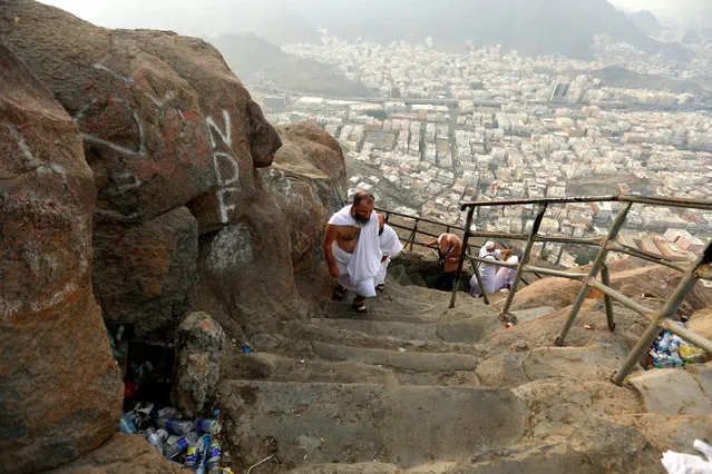 Muslim pilgrims visit Mount Al-Noor, where Muslims believe Prophet Mohammad received the first words of the Koran through Gabriel in the Hera cave, ahead of the annual haj pilgrimage in the holy city of Mecca, Saudi Arabia September 7, 2016. (Photo by Ahmed Jadallah/Reuters)