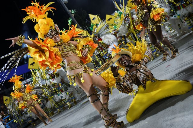 Revelers from Grande Rio Samba School perform during the night of the Carnival parade at the Sambadrome, in Rio de Janeiro, Brazil, on February 12, 2024. (Photo by Tita Barros/Reuters)