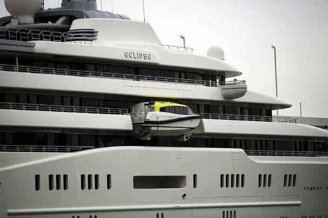 The Eclipse, reported to be the largest private yacht in the world, is viewed docked at a pier in New York on February 19, 2013 in New York City. The boat, which measures 557ft in length and is estimated to cost 1.5 billion US dollars, is owned by Russian billionaire Roman Abramovich and arrived into New York on Wednesday.  (Photo by Spencer Platt)