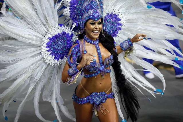 A member of the samba school Grupo Especial Rosas de Ouro takes part in the carnival celebration at the Anhembi sambodrome in Sao Paulo, Brazil, 10 February 2018. (Photo by Sebastiao Moreira/EPA/EFE)