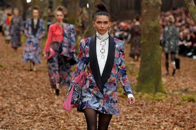 A model presents a creation by German designer Karl Lagerfeld as part of his Autumn/Winter 2018-2019 women's ready-to-wear collection show for fashion house Chanel at the Grand Palais during Paris Fashion Week on March 6, 2018 in Paris, France. (Photo by Pascal Rossignol/Reuters)