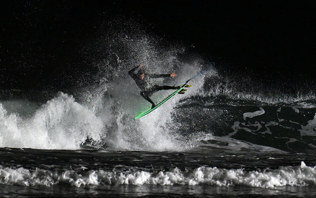 France's Sam Piter competes in a surf session during the Anglet Night Surfing competition 2025 at the “Chambre d'amour” beach in Anglet, south-western France, on August 22, 2025. (Photo by Gaizka Iroz/AFP Photo)