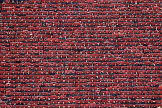 Troops hold coloured cards during a military parade celebrating Independence Day at Zocalo square in downtown Mexico City, in this September 16, 2014 file photo. (Photo by Edgard Garrido/Reuters)