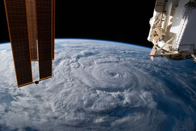 Hurricane Genevieve is seen off Mexico's Pacific coast from the International Space Station (ISS) orbiting Earth in an image taken by NASA astronaut Christopher J. Cassidy on August 19, 2020. (Photo by Christopher J. Cassidy/NASA via Reuters)