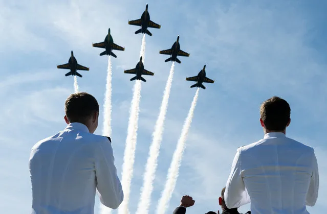 The US Navy Blue Angels fly over the 2023 US Naval Academy Graduation and Commissioning Ceremony at the Navy-Marine Corps Memorial Stadium in Annapolis, Maryland, May 26, 2023. (Photo by Saul Loeb/AFP Photo)