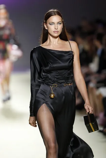 Model Irina Shayk wears a creation as part of Versace's women's 2019 Spring-Summer collection, unveiled during the Fashion Week in Milan, Italy, Friday, September 21, 2018. (Photo by Antonio Calanni/AP Photo)