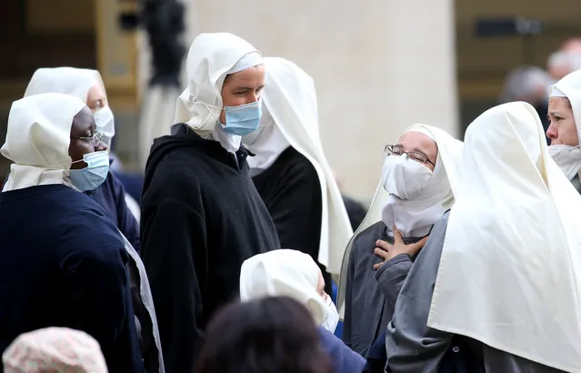 Nuns attend Pope Francis' weekly General Audience in the Courtyard of St Damasus on May 12, 2021 in Vatican City, Vatican. Pope Francis recalled the attack on St Pope John Paul II 40 years ago, the liturgical feast of Our Lady of Fatima and he invited the faithful to recite the Holy Rosary for the end of the pandemic. (Photo by Franco Origlia/Getty Images)