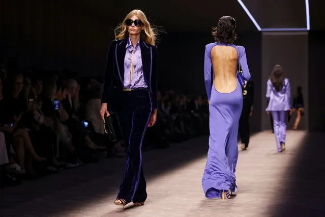 Models present creations from the Tom Ford Summer 2024 collection, designed by Peter Hawkings during Fashion Week in Milan, Italy on September 21, 2023. (Photo by Claudia Greco/Reuters)
