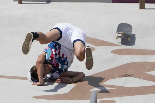 Jagger Eaton of the United States tumbles during the men's street skateboarding finals at the 2020 Summer Olympics, Sunday, July 25, 2021, in Tokyo, Japan. (Photo by Jae C. Hong/AP Photo)