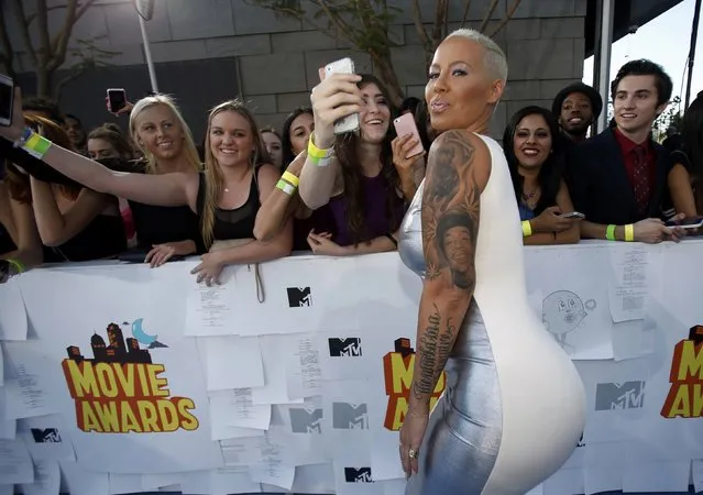 Model Amber Rose arrives at the 2015 MTV Movie Awards in Los Angeles, California April 12, 2015. (Photo by Mario Anzuoni/Reuters)