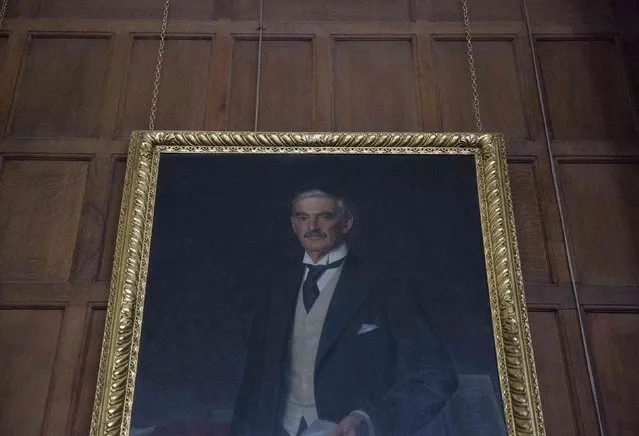 A painting of former pupil, and British Prime Minister, Neville Chamberlain hangs on a wall at Rugby School in central England, March 18, 2015. (Photo by Neil Hall/Reuters)