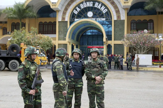 Vietnamese soldiers stand guard at the entrance to Dong Dang train station where North Korean leader Kim Jong Un is expected to arrive at the border town with China, in Dong Dang, Lang Son province, Vietnam, Monday, February 25, 2019. The second summit between U.S. President Donald Trump and North Korean leader Kim Jong Un will take place in Hanoi on Feb. 27 and 28. (Photo by Minh Hoang/AP Photo)