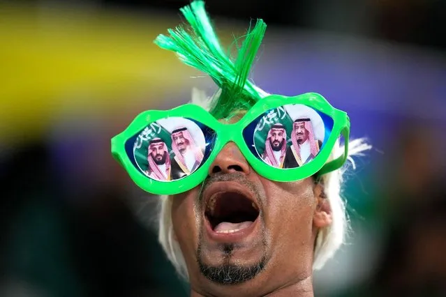 A supporter of Saudi Arabia shouts for his team ahead of the Asian Cup Group F soccer match between Saudi Arabia and Oman at Khalifa International Stadium in Doha, Qatar, Tuesday, January 16, 2024. (Photo by Aijaz Rahi/AP Photo)