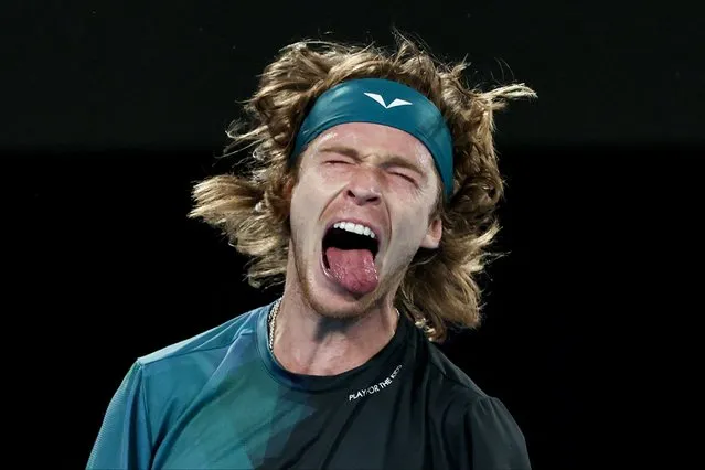 Russia's Andrey Rublev reacts against Australia's Alex De Minaur during their men's singles match on day eight of the Australian Open tennis tournament in Melbourne on January 21, 2024. (Photo by Martin Keep/AFP Photo)