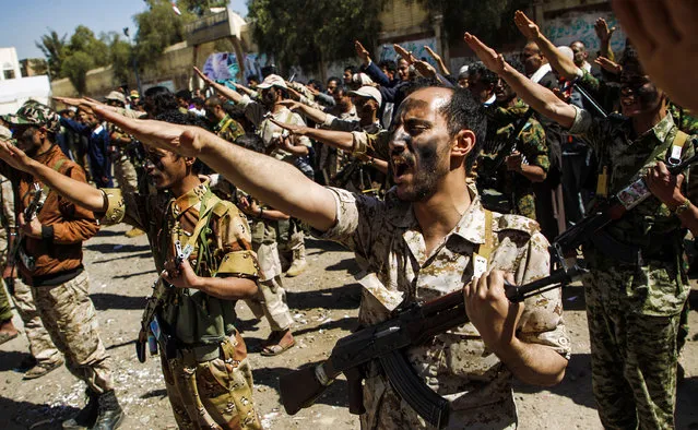 Newly recruited Houthi fighters chant slogans during a gathering in the capital Sanaa to mobilize more fighters to battlefronts to fight pro-government forces in several Yemeni cities, on February 2, 2017. (Photo by Mohammed Huwais/AFP Photo)