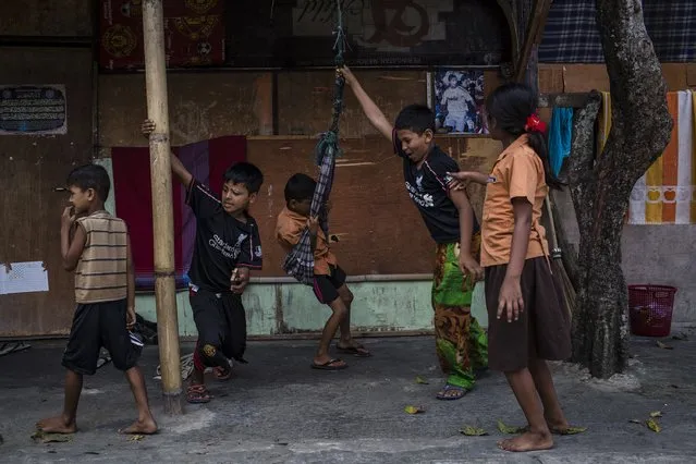 Rohingya refugees children play outside of their refugee camp on February 11, 2017 in Medan, North Sumatra, Indonesia. (Photo by Ulet Ifansasti/Getty Images)