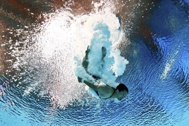 Song Nam Hyang of North Korea is seen underwater during the women's 10m platform preliminary event at the Aquatics World Championships in Kazan, Russia July 29, 2015. (Photo by Stefan Wermuth/Reuters)