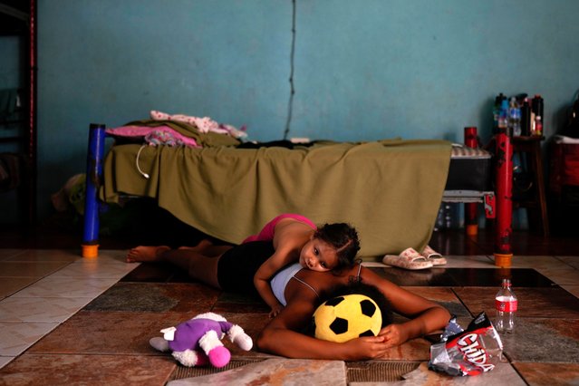 Honduran migrant Mayra Torres hugs her sister in a shelter in Tapachula, Mexico, Monday, October 28, 2024. (Photo by Matias Delacroix/AP Photo)