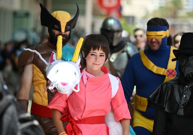 Cosplayers attend Comic-Con International in San Diego, California, on July 23, 2022. (Photo by Robyn Beck/AFP Photo)
