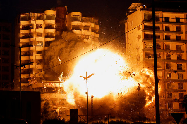 A view shows the moment of an Israeli strike on a building, amid the ongoing hostilities between Hezollah and Israeli forces, in the Chiyah district of Beirut's southern suburbs, Lebanon, on November 25, 2024. (Photo by Adnan Abidi/Reuters)