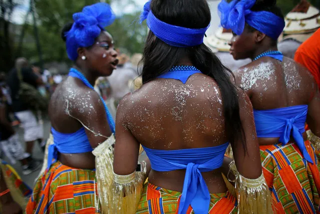 Revelers participate in the annual West Indian Day parade held on September 1, 2014 in the Brooklyn borough of New York City. The parade, which draws a crowd of a million plus, celebrates Caribbean culture. (Photo by Yana Paskova/Getty Images)