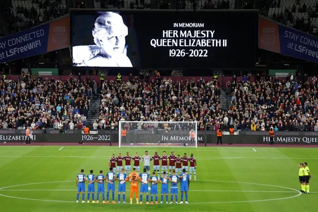 The players line up as the big screen displays a message in memoriam following the announcement of the death of Queen Elizabeth II, before the UEFA Europa Conference League Group B match at the London Stadium in London on Thursday, September 8, 2022. (Photo by Peter Cziborra/Action Images via Reuters)