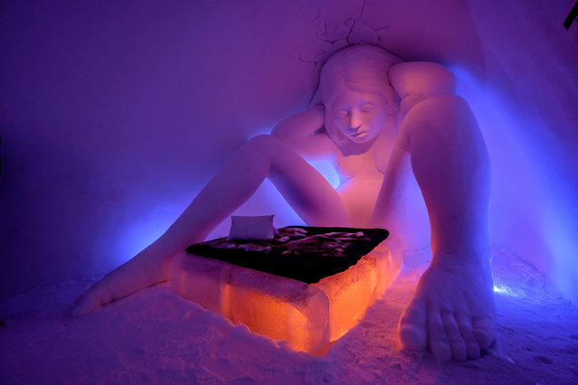 A view of the room called “DON´T GET UP” that was created by artists Wilfred Stijger and Edith Van De Wetering at Icehotel 34 on December 15, 2023 in Jukkasjarvi, Sweden. Since 1989, the Icehotel – part hotel, part art exhibition – has been crafted annually from ice taken from the Torne River. (Photo by Roy Rochlin/Getty Images)