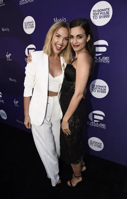 Arielle Kebbel, left, and Torrey DeVitto arrive at onePULSE: A Benefit for Orlando at NeueHouse Hollywood on Friday, August 19, 2016, in Los Angeles. (Photo by Dan Steinberg/Invision for onePulse Foundation/AP Images)