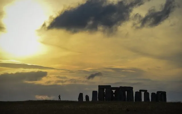 Sunset at Stonehenge ahead of Summer Solstice on June 20, 2020 in Amesbury, United Kingdom. English Heritage, which manages the site, said “Our priority is always to ensure the safety and wellbeing of staff, volunteers, attendees and residents. The decision to remain closed for Summer Solstice 2020 was made due to the on-going ban on mass gatherings and the need to maintain social distancing – still the mainstay of measures to combat Coronavirus. Before making this decision we consulted widely with partners, including Wiltshire Council, the police, ambulance services and Avebury Parish Council”. (Photo by Finnbarr Webster/Getty Images)