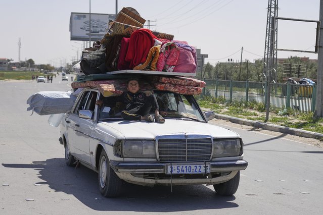 Palestinians who fled Rafah after Israeli evacuation orders, arrive in Khan Younis, Gaza, on Monday, March 31, 2025. (Photo by Abdel Kareem Hana/AP Photo)