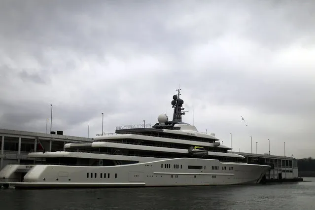 The Eclipse, reported to be the largest private yacht in the world, is viewed docked at a pier in New York on February 19, 2013 in New York City. The boat, which measures 557ft in length and is estimated to cost 1.5 billion US dollars, is owned by Russian billionaire Roman Abramovich and arrived into New York on Wednesday.   (Photo by Spencer Platt)