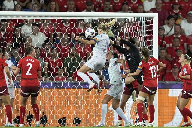 Norway's Ada Hegerberg, center, scores her side's first goal during the Euro 2025, group A, soccer match between Switzerland and Norway at St. Jakob-Park in Basel, Switzerland, Wednesday, July 2, 2025. (Photo by Martin Meissner/AP Photo)