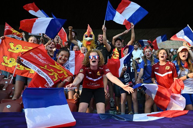 Fans for France celebrate the victory of their team at the end of the UEFA Women's Euro 2025 Group D football match between France and England at the Letzigrund Stadium in Zurich, on July 5, 2025. France won 2-0 over England. (Photo by Sébastien Bozon/AFP Photo)
