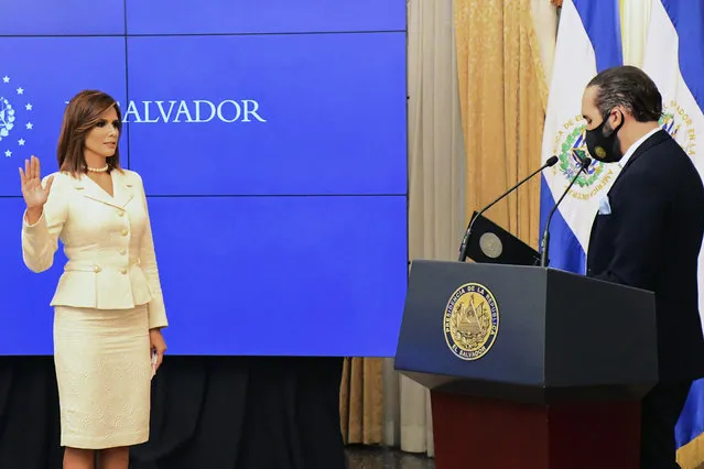 In this In this photo released by the El Salvador Presidential Press Office, Salvadoran President Nayib Bukele swears in Milena Mayorga as the country's next ambassador to the U.S., at Government House, in San Salvador, El Salvador, Thursday, September 24, 2020.  A top 10 finalist in the 1996 Miss Universe pageant, Mayorga is a political neophyte with no previous diplomatic experience, having been elected to congress for the first time in 2018. (Photo by El Salvador Presidential Press Office via AP Photo)