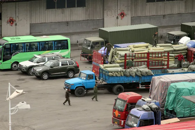 In this Thursday, March 17, 2016 photo, cargo trucks and other vehicles wait at a border checkpoint to cross into North Korea in Dandong in northeastern China's Liaoning Province. Chinese authorities are investigating a company that researchers say sold North Korea materials that can be used by its growing nuclear weapons program in a crackdown that reflects Beijing's growing frustration with its isolated neighbor. (Photo by Chinatopix via AP Photo)