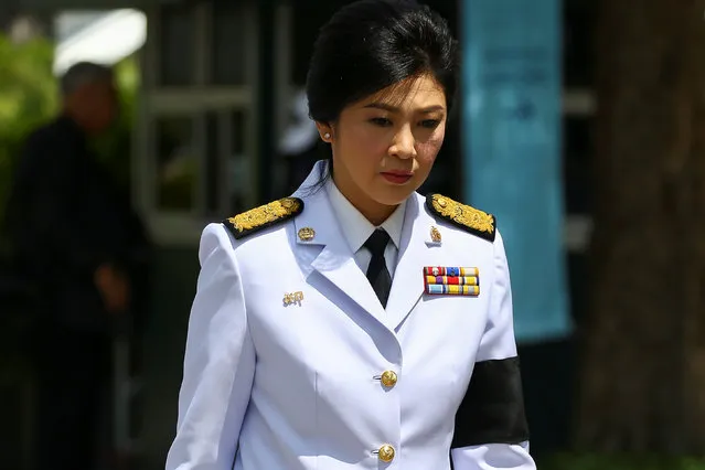 Former Thai Prime Minister Yingluck Shinawatra arrives at the Grand Palace to offer condolences for Thailand's late King Bhumibol Adulyadej, in Bangkok, Thailand, October 14, 2016. (Photo by Athit Perawongmetha/Reuters)