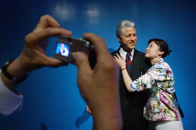 A wax statue of former President Bill Clinton at the  Madame Tussauds wax statues museum in Shanghai, China May 1, 2006. (Photo by Aly Song/Reuters)