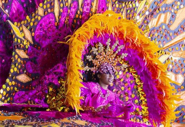 A dressed-up competitor performs during the King and Queen Showcase of the 2024 Toronto Caribbean Carnival in Toronto, Canada, August 1, 2024. Dozens of masqueraders competed for the King and Queen of the Carnival here on Thursday. (Photo by Xinhua News Agency/Rex Features/Shutterstock)