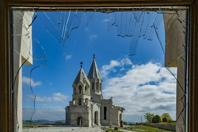 View from a broken window of a building near the Shushi cathedral, Ghazanchetsots Cathedral, after Azerbaijan shelling that destroyed part of roof in a double attack on October 11, 2020. (Photo by Celestino Arce Lavin/ZUMA Wire/Rex Features/Shutterstock)