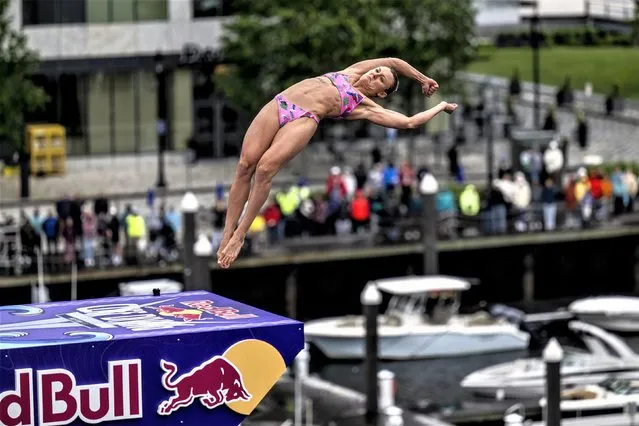In this handout image provided by Red Bull, Iris Schmidbauer of Germany dives from the 21-metre platform on the Institute of Contemporary Art during the final competition day of the first stop of the Red Bull Cliff Diving World Series on June 03, 2023 at Boston, Massachusetts. (Photo by Dean Treml/Red Bull via Getty Images)
